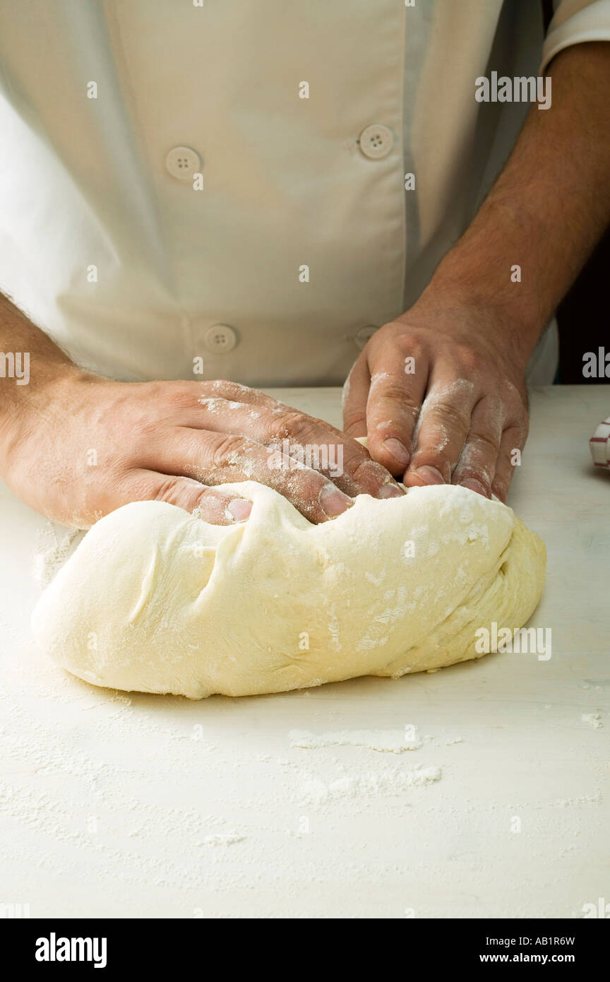 Kneading pizza dough FoodCollection Stock Photo - Alamy