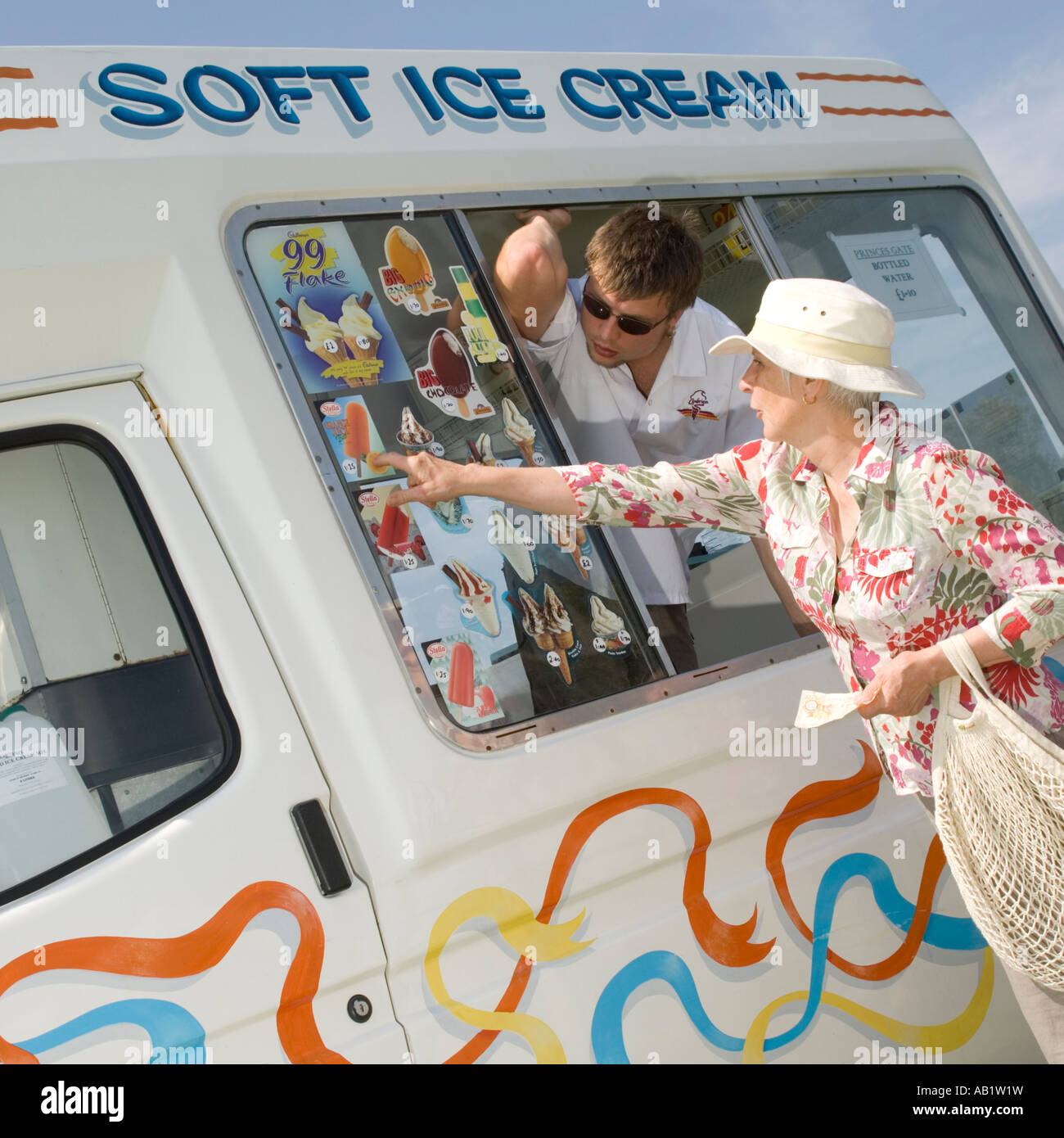 elderly woman choosing ice cream at mobile ice cream van in Wales Stock Photo Alamy