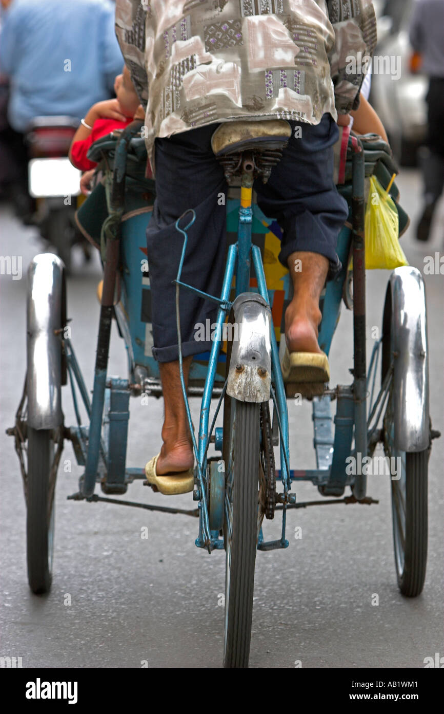 Cycle Rickshaw Back Rear view of cyclo rickshaw and driver Ho Chi Minh City Vietnam Stock ...