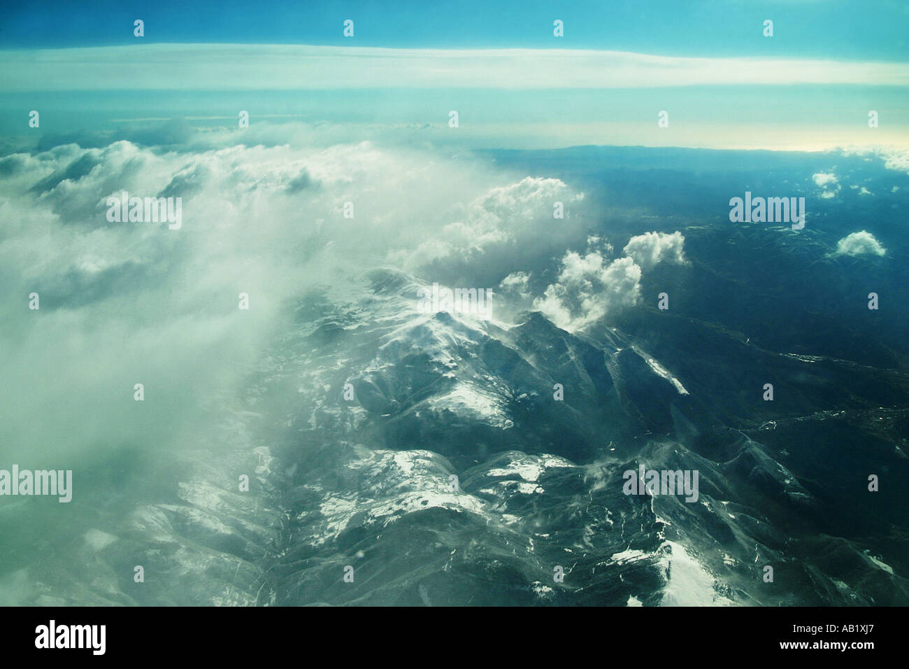 flying over a mountain range Stock Photo