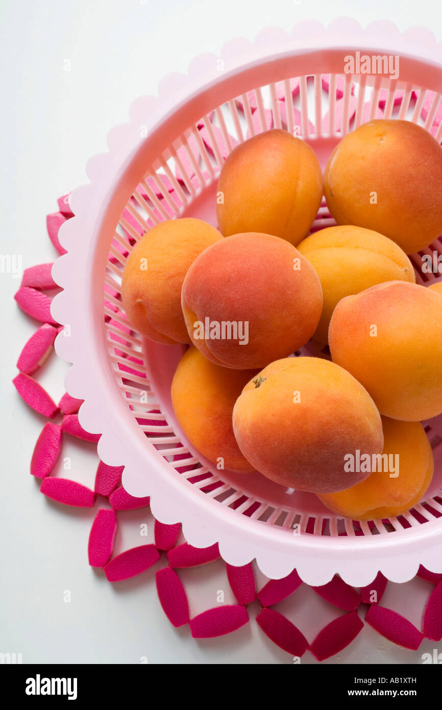 Apricots in plastic dish FoodCollection Stock Photo Alamy