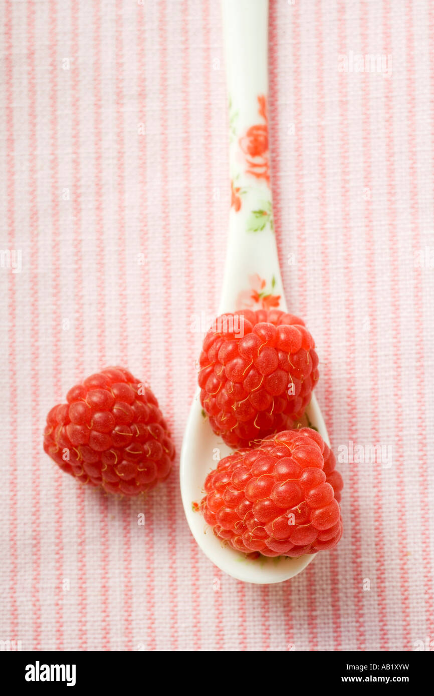 Raspberries on patterned spoon FoodCollection Stock Photo - Alamy
