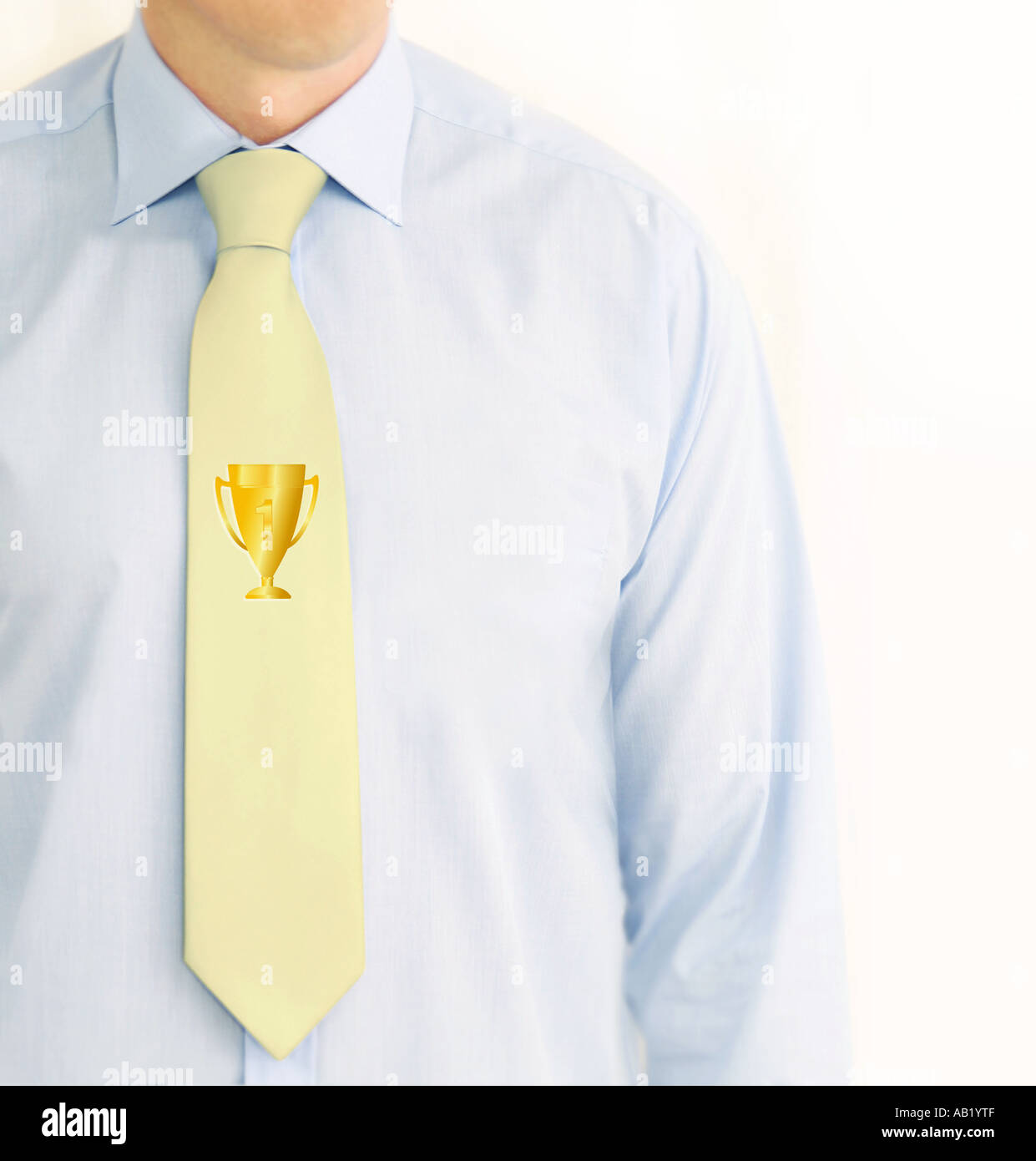 business man with a trophy on his tie Stock Photo