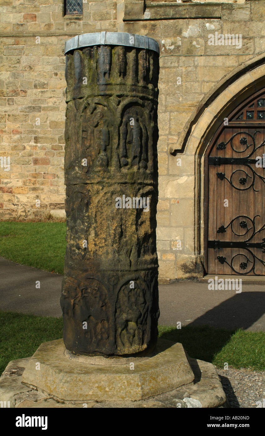 Anglo-Saxon cross shaft outside St. Mary's Church, Masham, North Yorkshire, England, UK Stock Photo