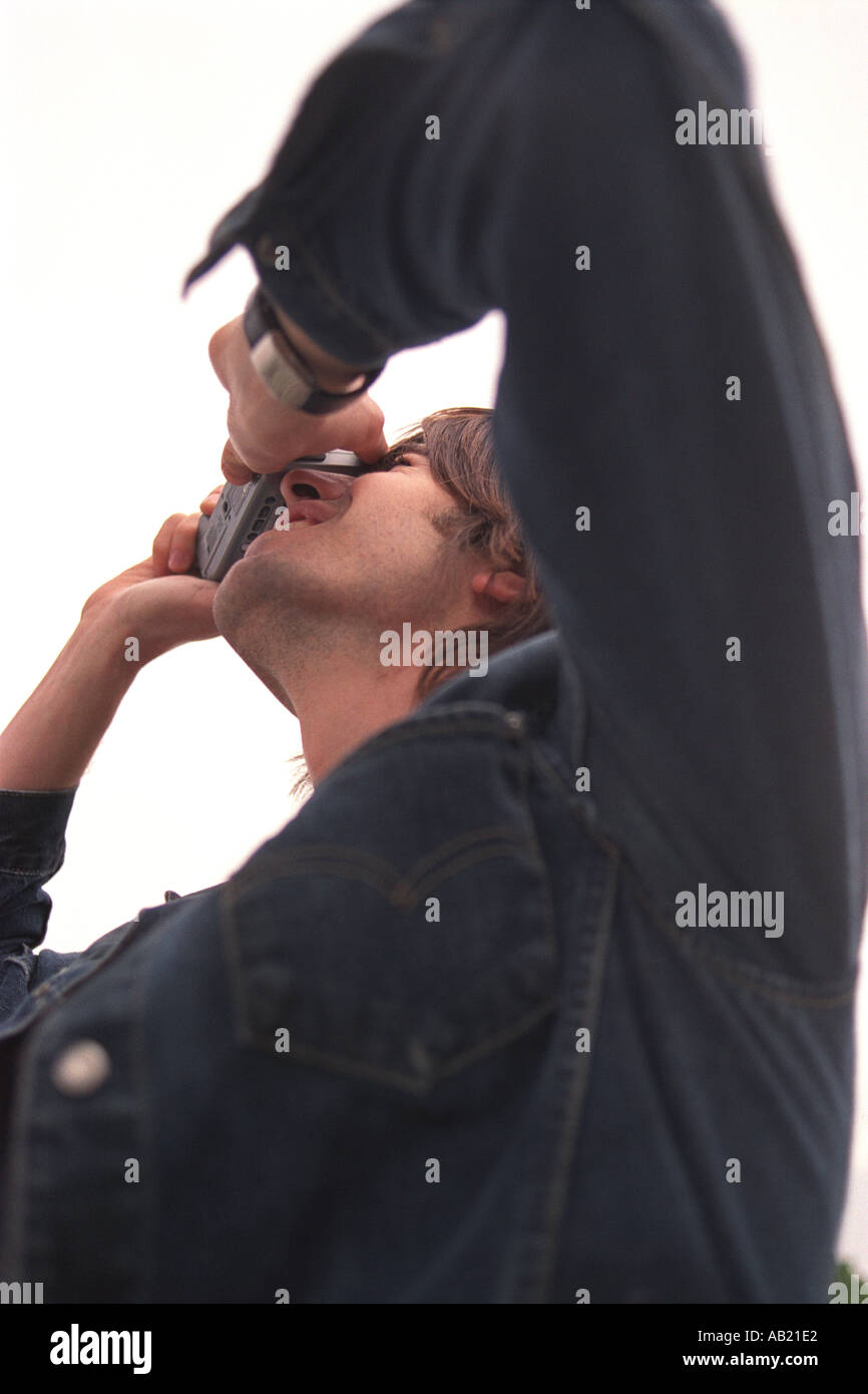 Young man taking photograph hi-res stock photography and images - Alamy