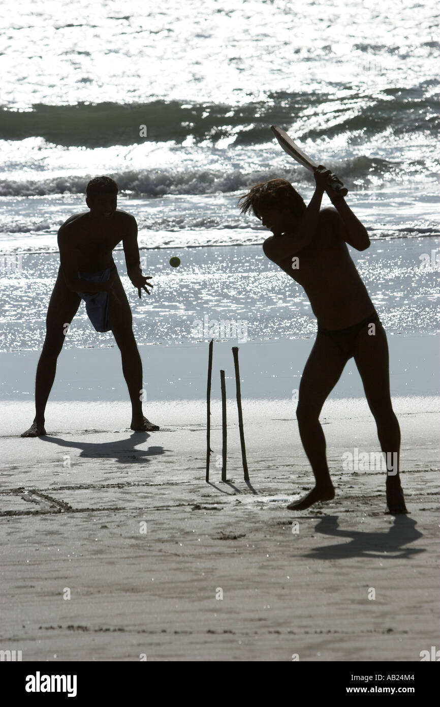 Beach cricket with bat sticks for stumps and tennis ball Fatrade Beach
