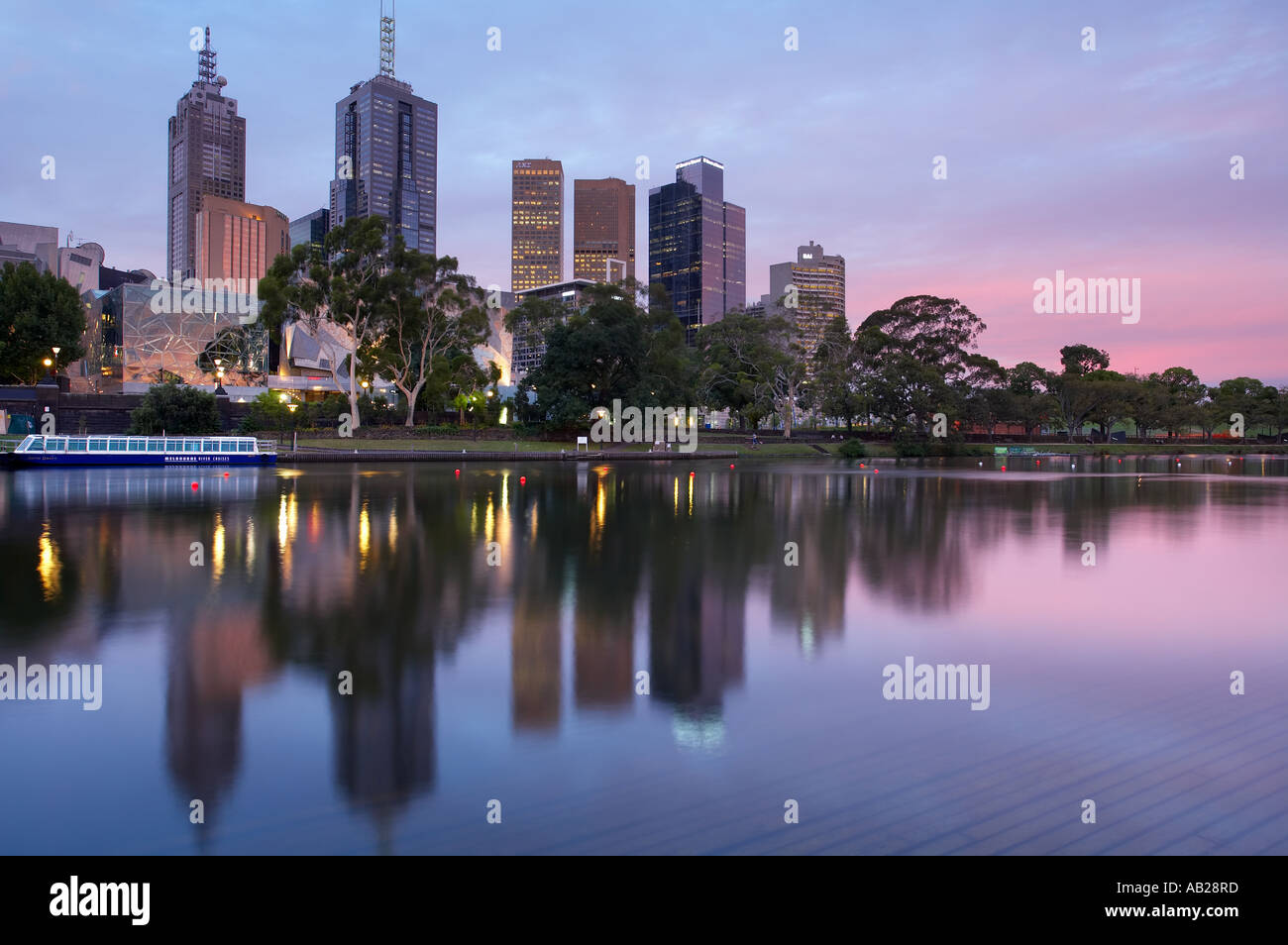 the Central Business District reflected in the Yarra River at dusk Melbourne Victoria Australia Stock Photo