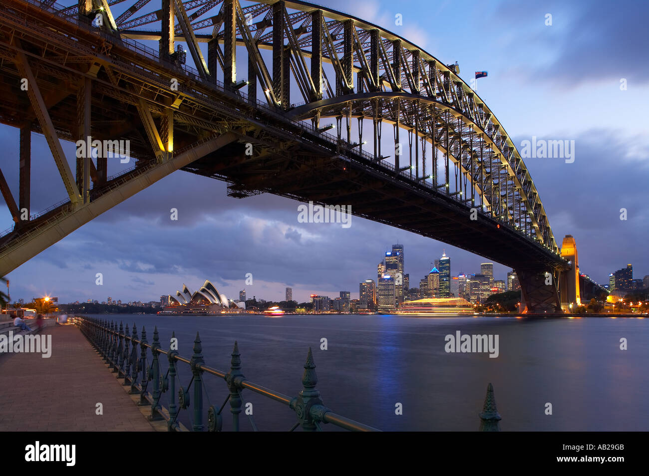 the Sydney Harbour Bridge and Opera House city centre from Milsons Point at night, Sydney, New South Wales, Australia Stock Photo