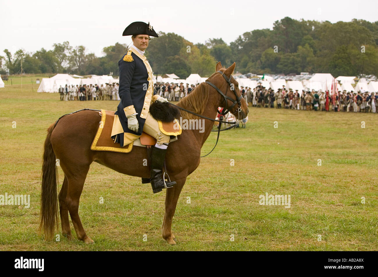 General George Washington reviews Patriot and Colonial Troops at camp before marching to Surrender Field at the 225th Anniversar Stock Photo