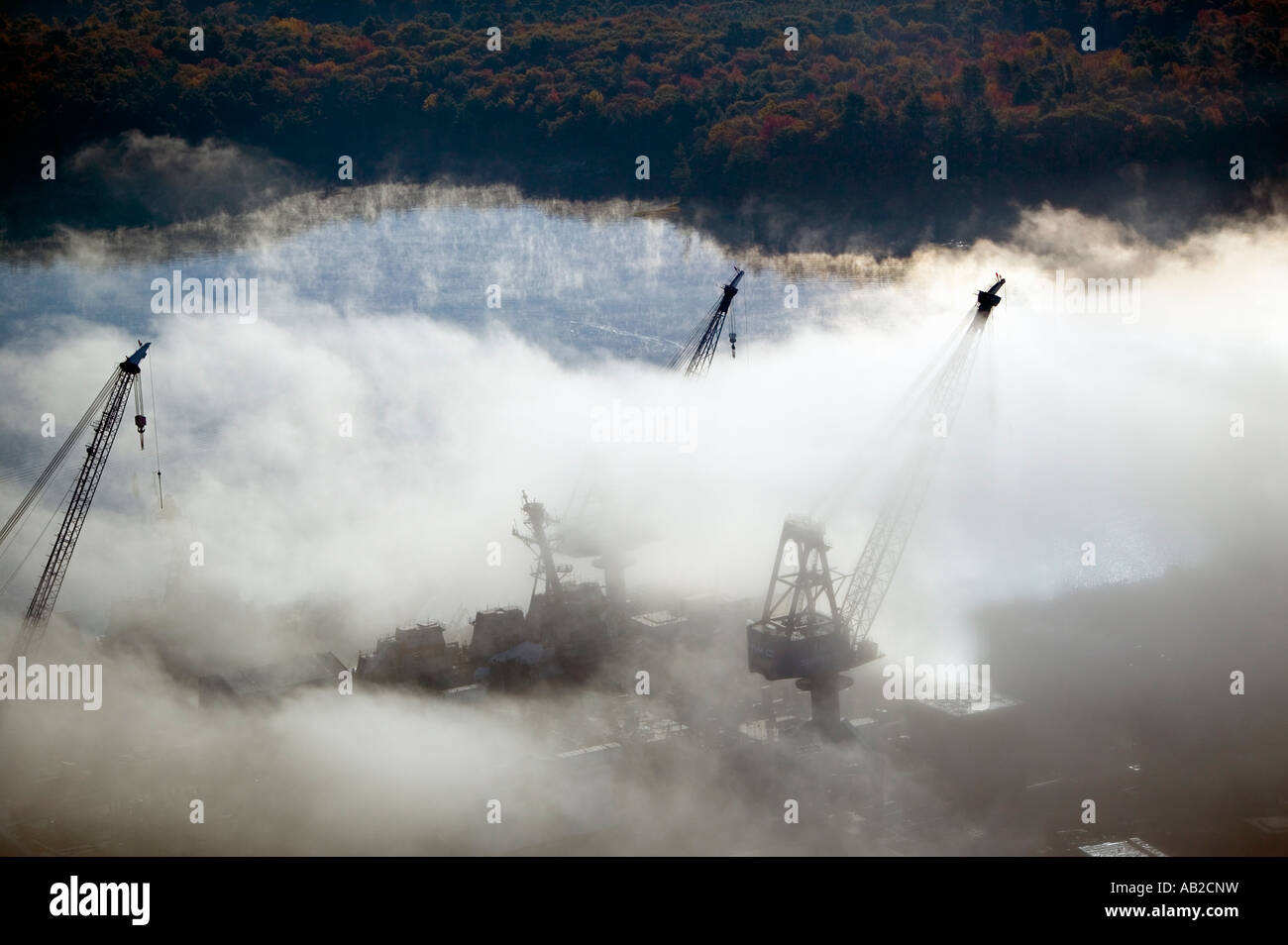 Aerial view of fog over Bath Iron Works and Kennebec River in Maine