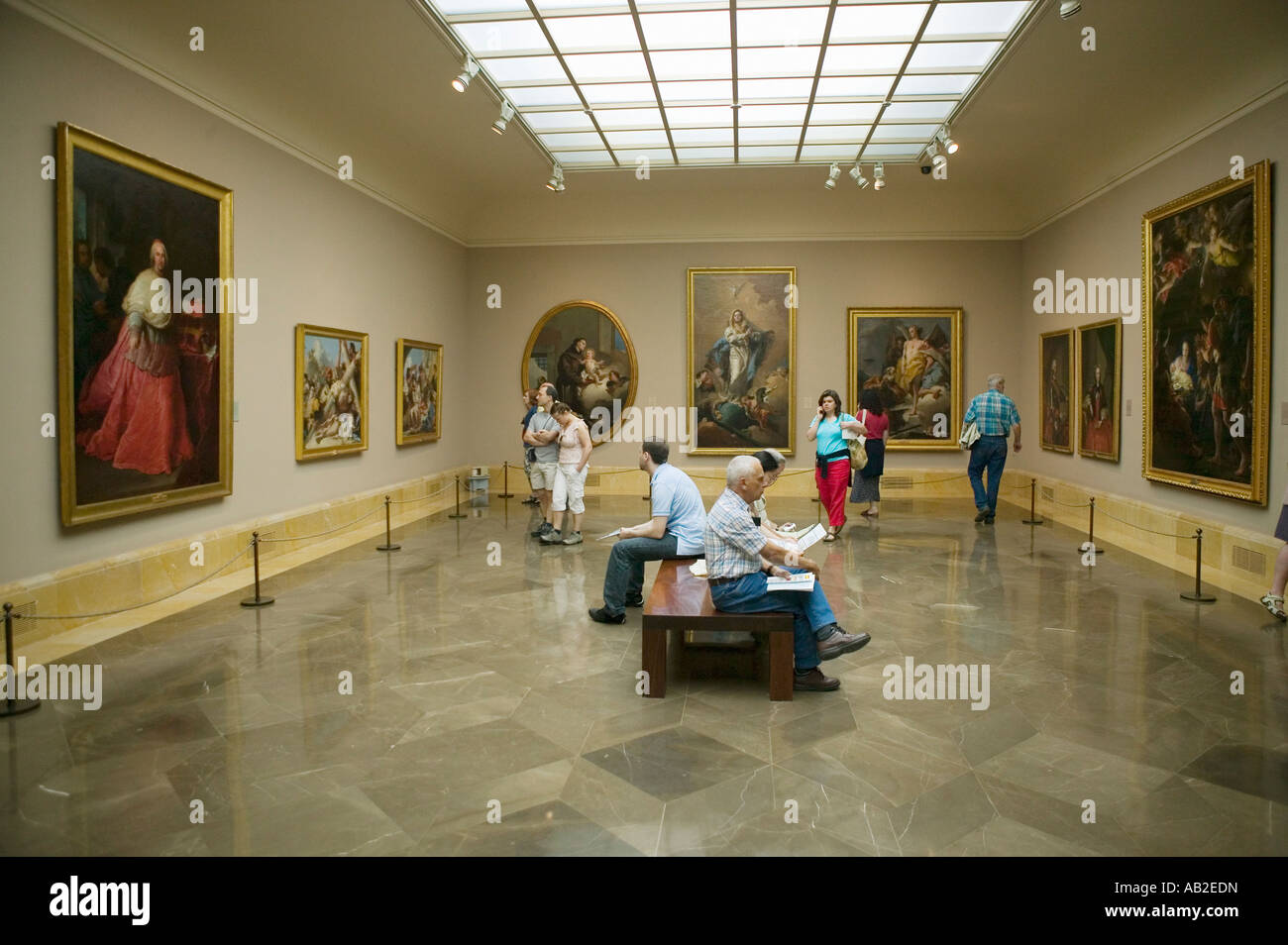 art-appreciators-view-paintings-in-museum-de-prado-prado-museum-madrid