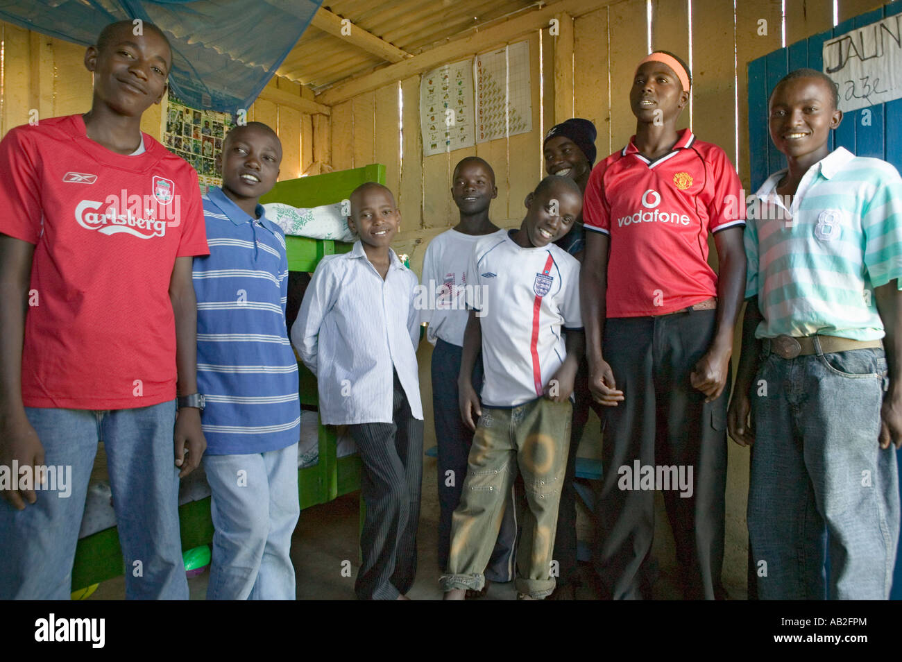 A group of young Kenyan males who are affected with HIV AIDS pose for