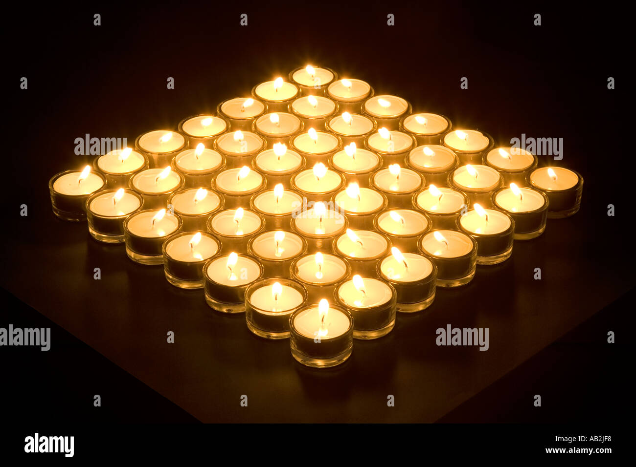 Square of lit candles Stock Photo Alamy