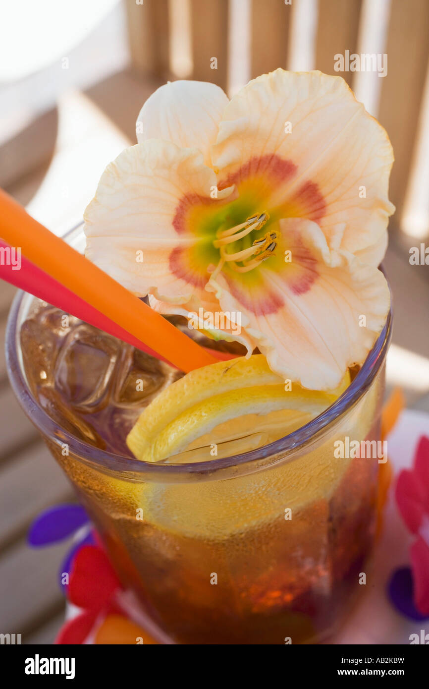 Cuba Libre with amaryllis flower FoodCollection Stock Photo