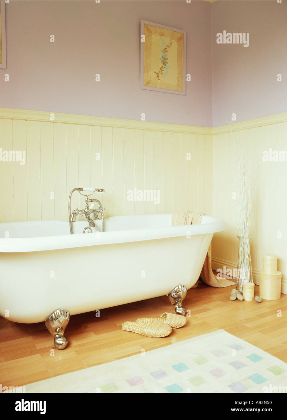 Interior bathroom Victorian roll top bath with claw feet Stock Photo