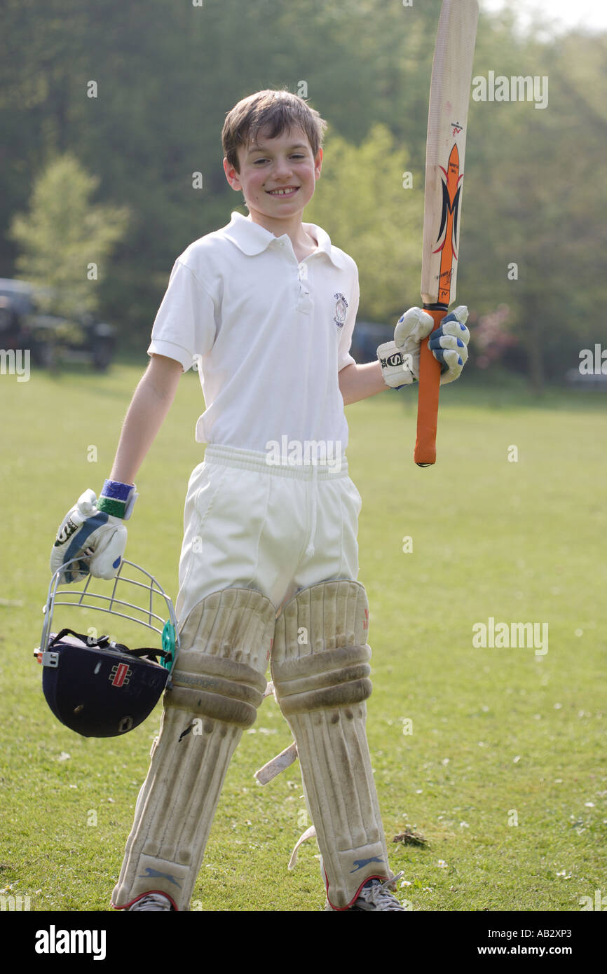 Proud boy at school cricket match Stock Photo