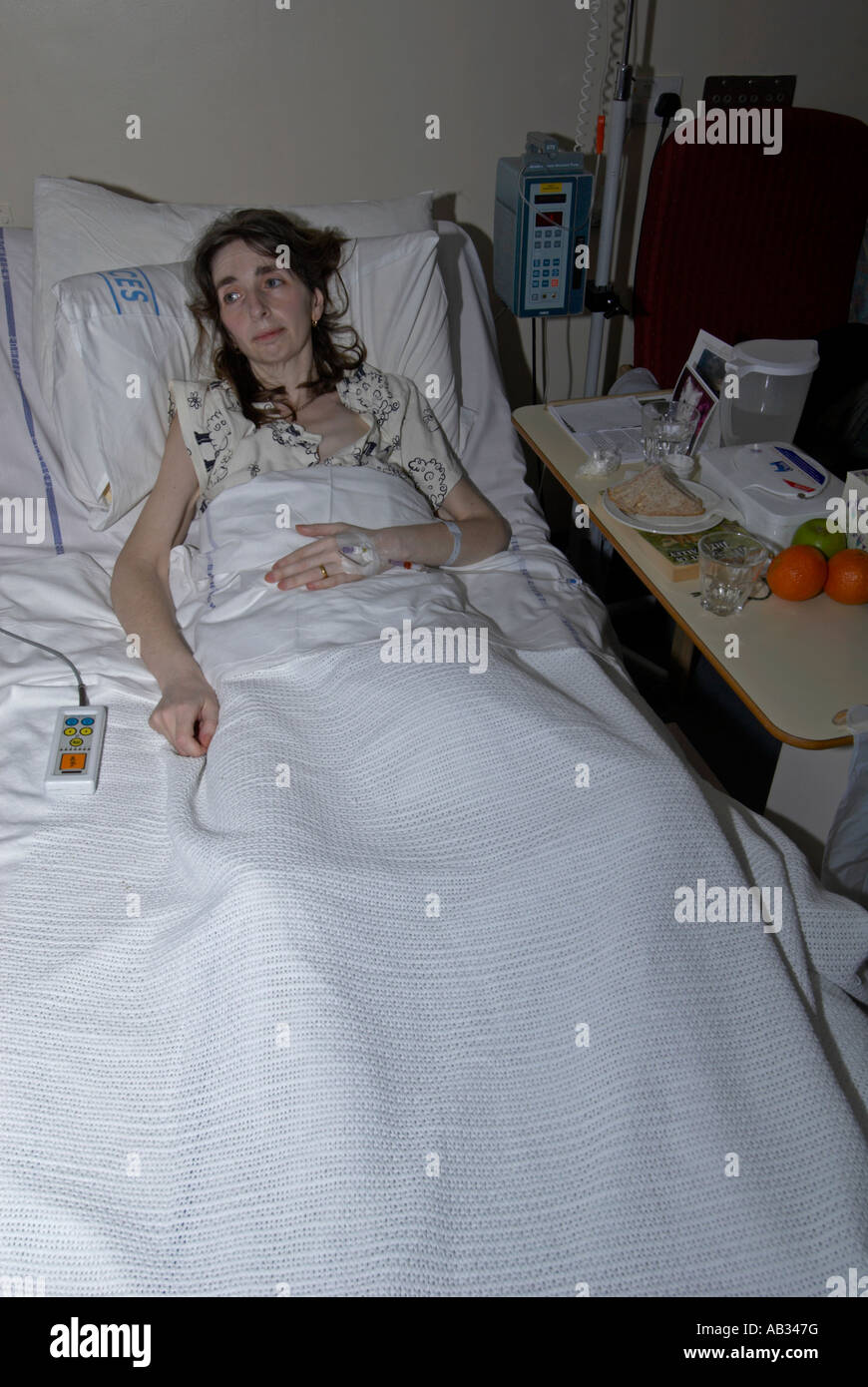 Female patient in cancer ward worrying about her treatment in her 30s / 40s Stock Photo