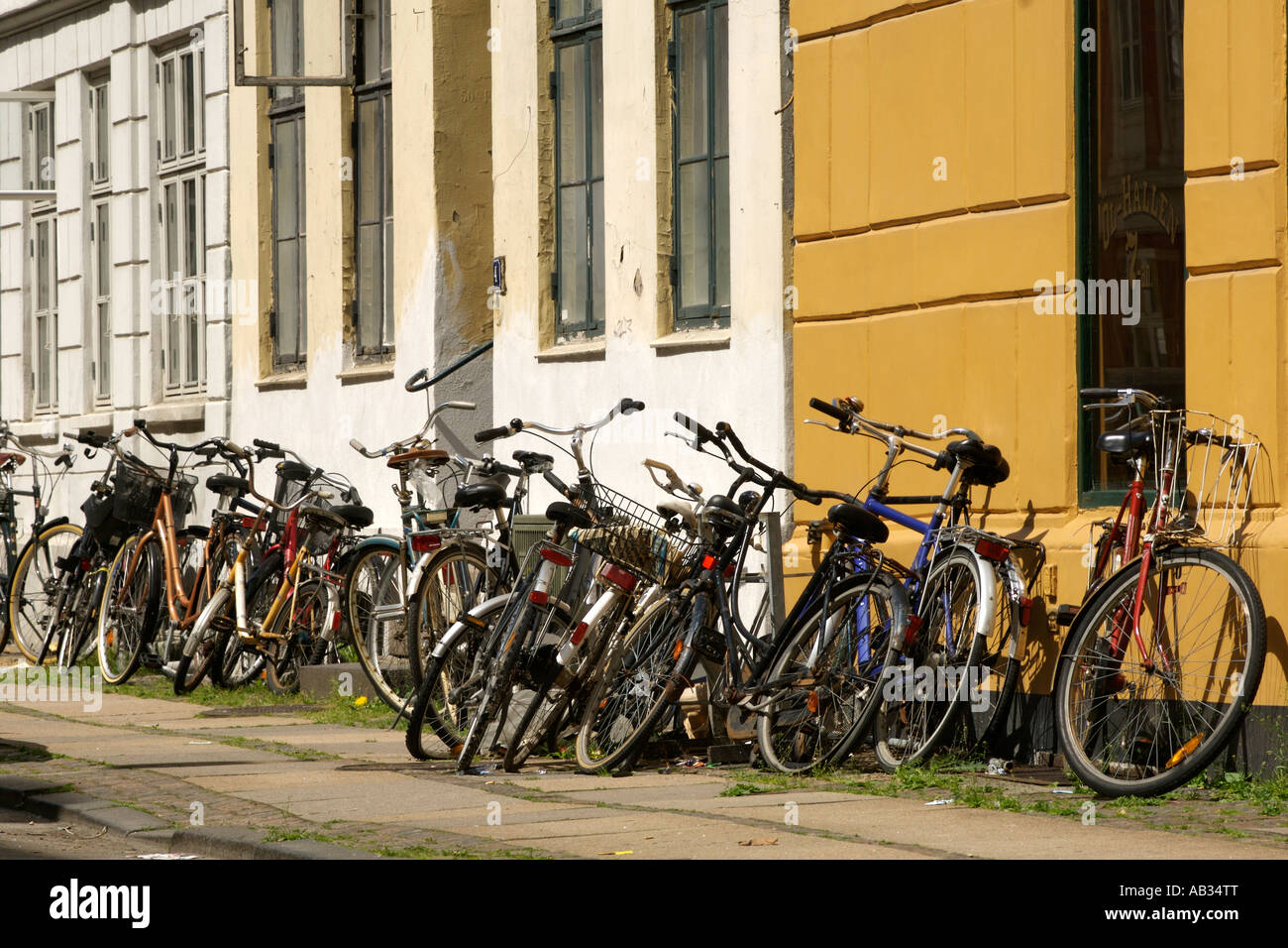 Bicycles along a street in Copenhagen Denmark. Stock Photo