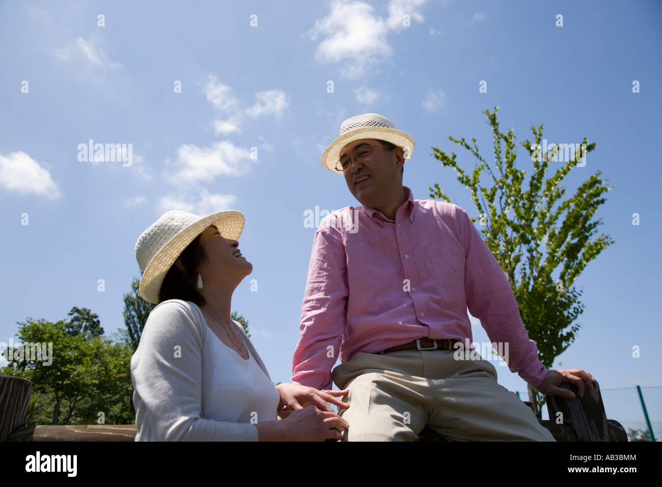 Middle age couple sitting asian hi-res stock photography and images - Alamy