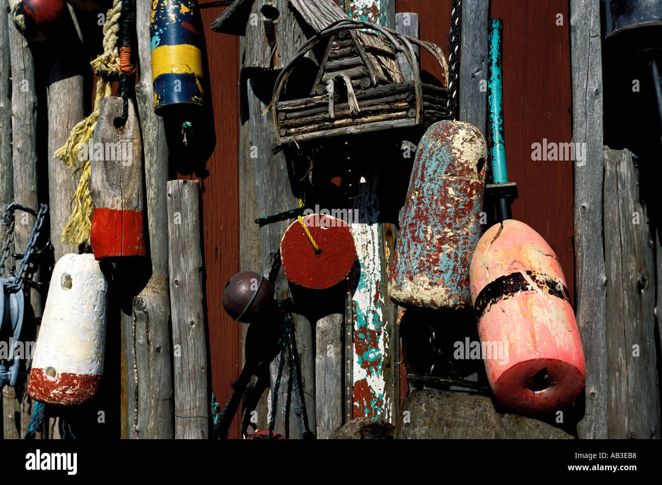 buoys against barn boards Stock Photo