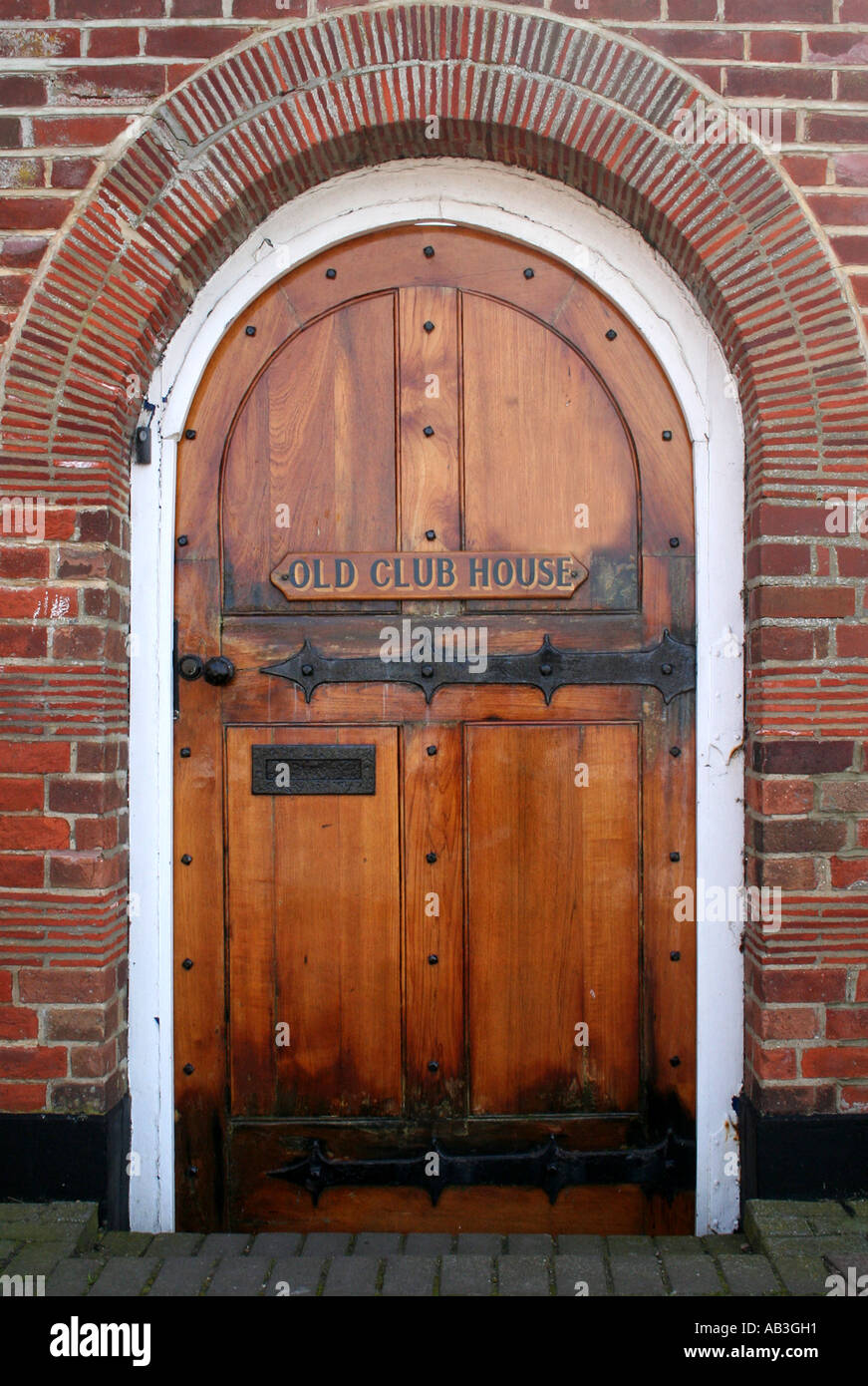 Old Wooden Arched Period Door in Burnham on Crouch, Essex, England Stock Photo