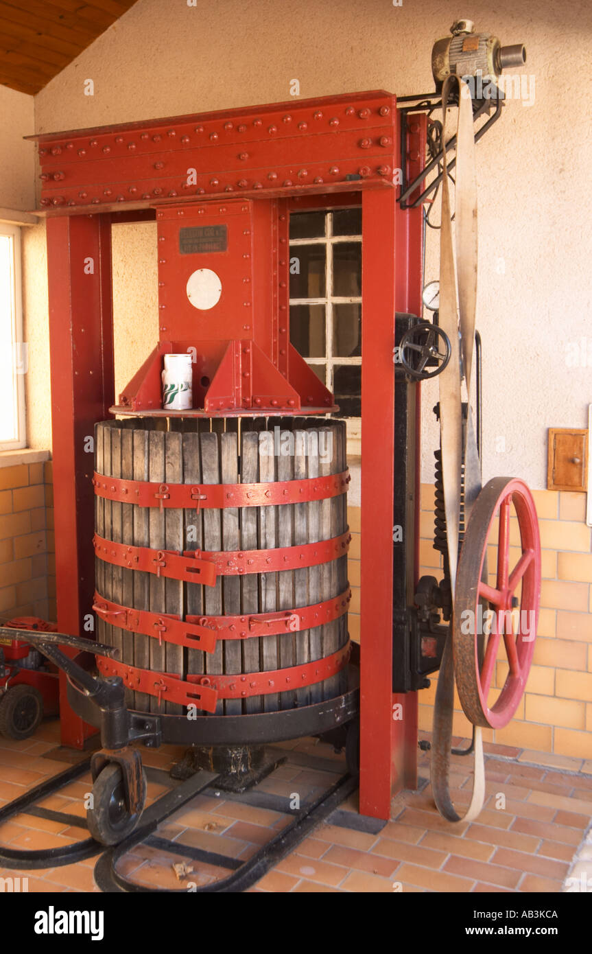 A wine press that is also some100 years old. It produces a pressure of ...