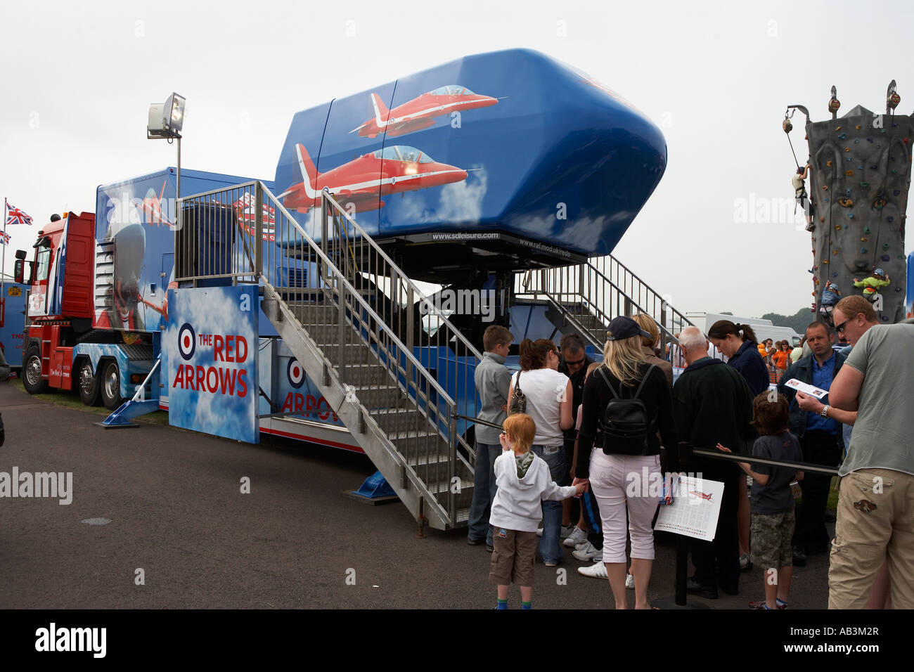 people queuing to ride the red arrows virtual ride at cosford airshow raf cosford shifnal shropshire england uk Stock Photo