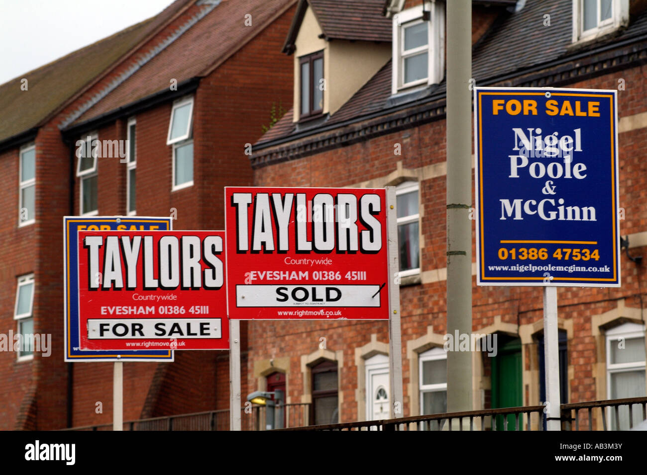 For sale boards outside homes in the west country England UK Stock
