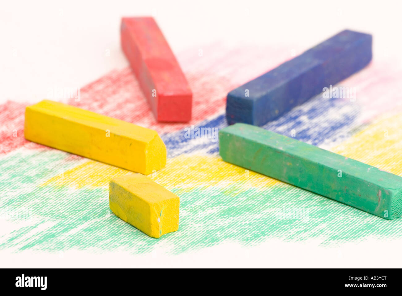 Multi Coloured Chalk sticks on a plain background Stock Photo Alamy
