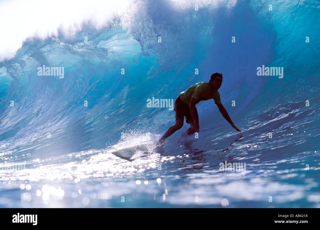 Surfer riding a huge wave Stock Photo - Alamy