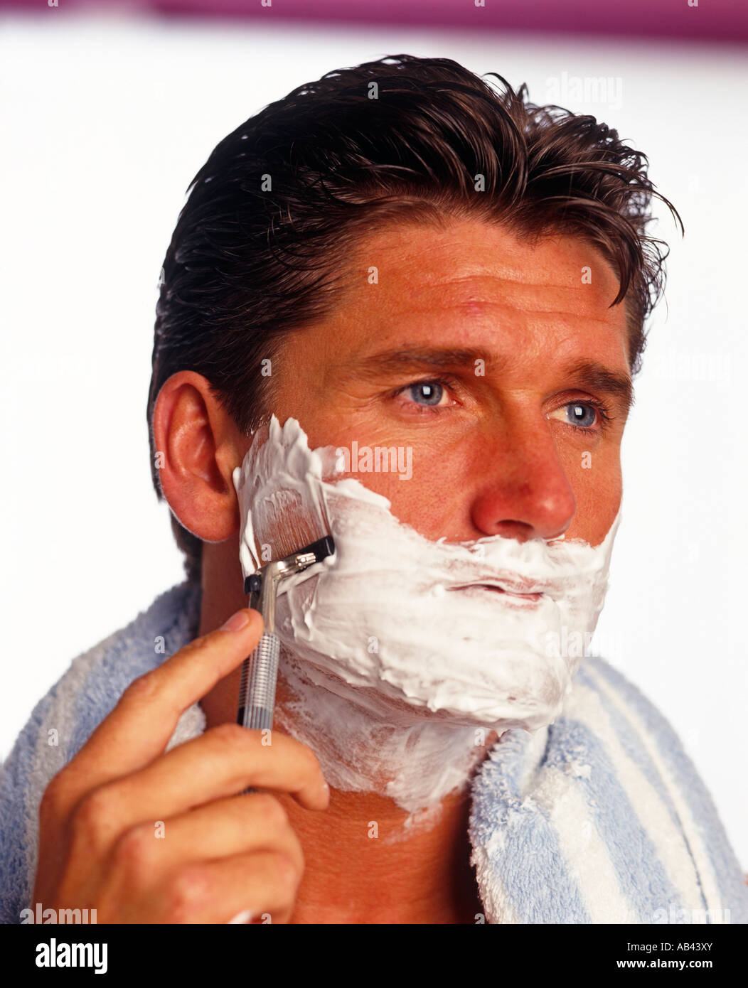 Man shaving Stock Photo