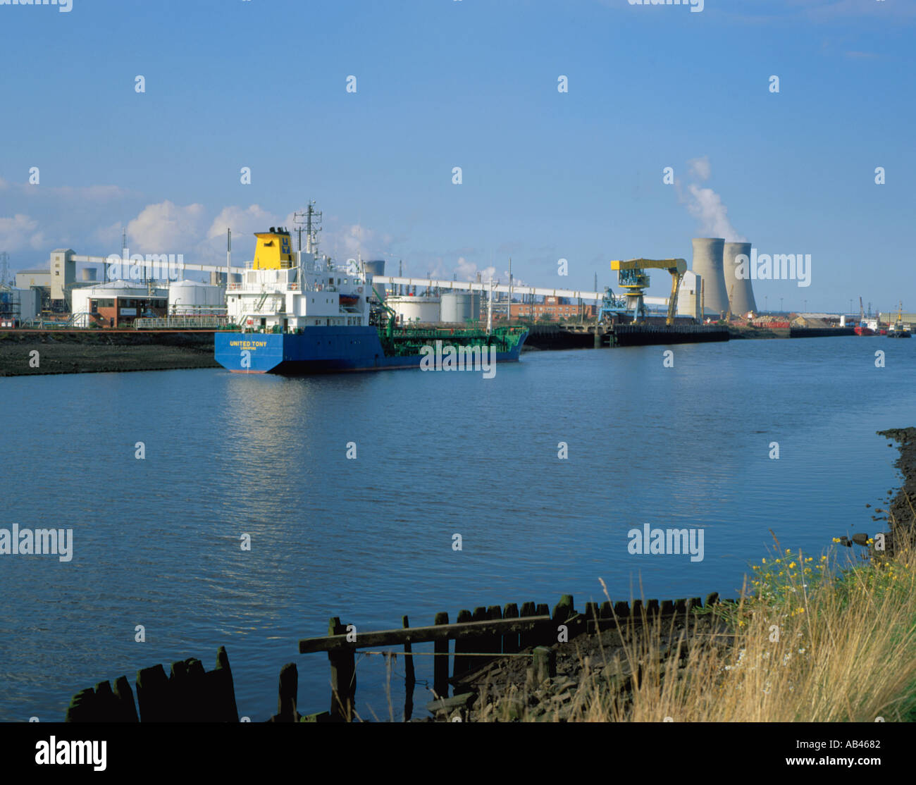 Swedish freighter on River Tees beside Billingham chemical complex, Billingham, Teesside, Cleveland, England, UK. in the 1990s Stock Photo