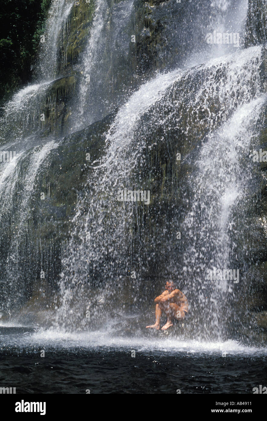 Sitting under waterfall hires stock photography and images Alamy