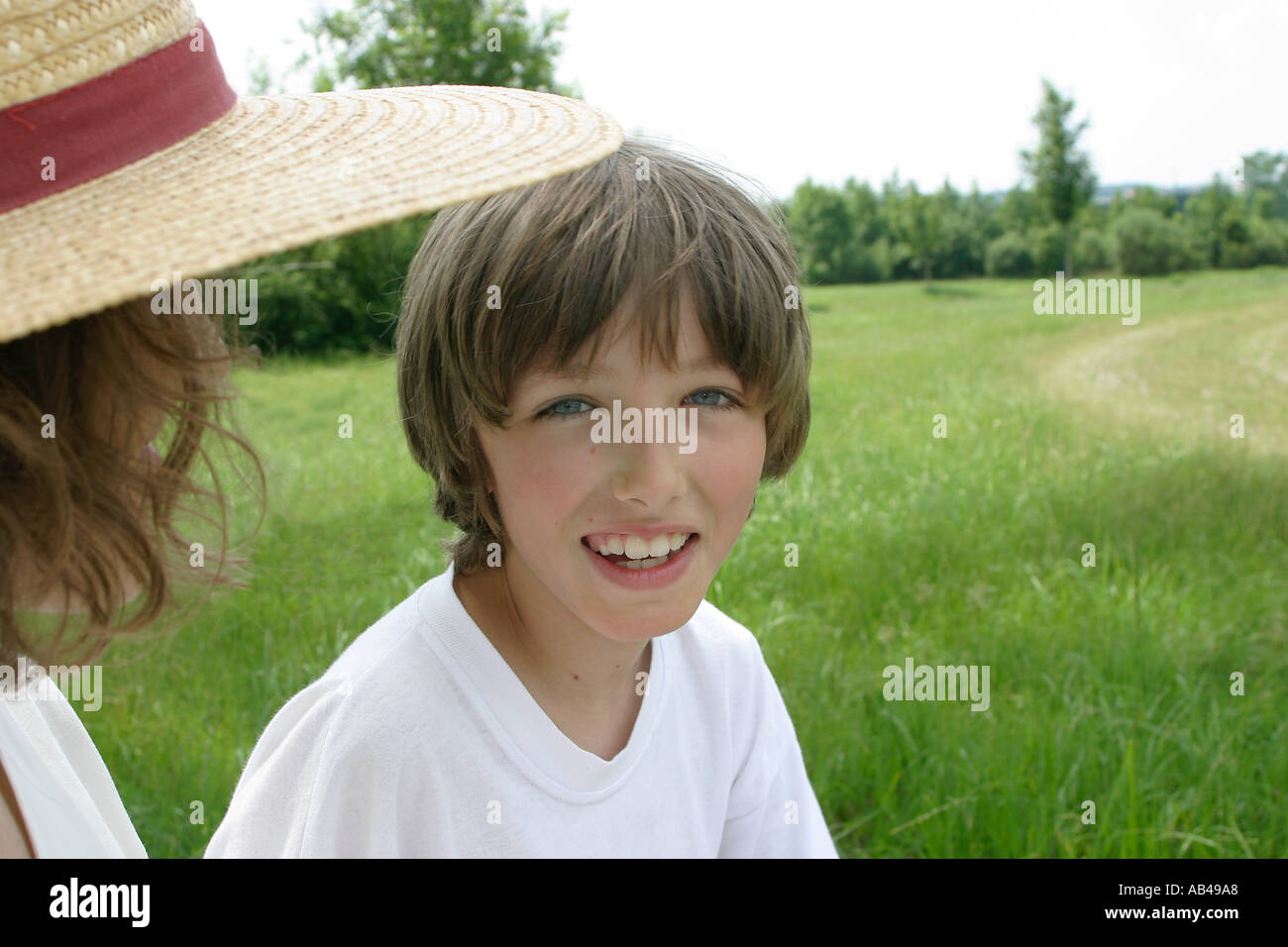 contented boy in the green Stock Photo