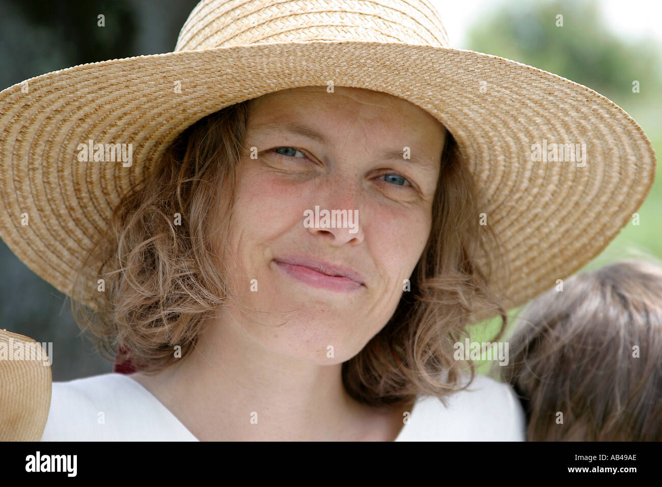 woman with strawhat Stock Photo