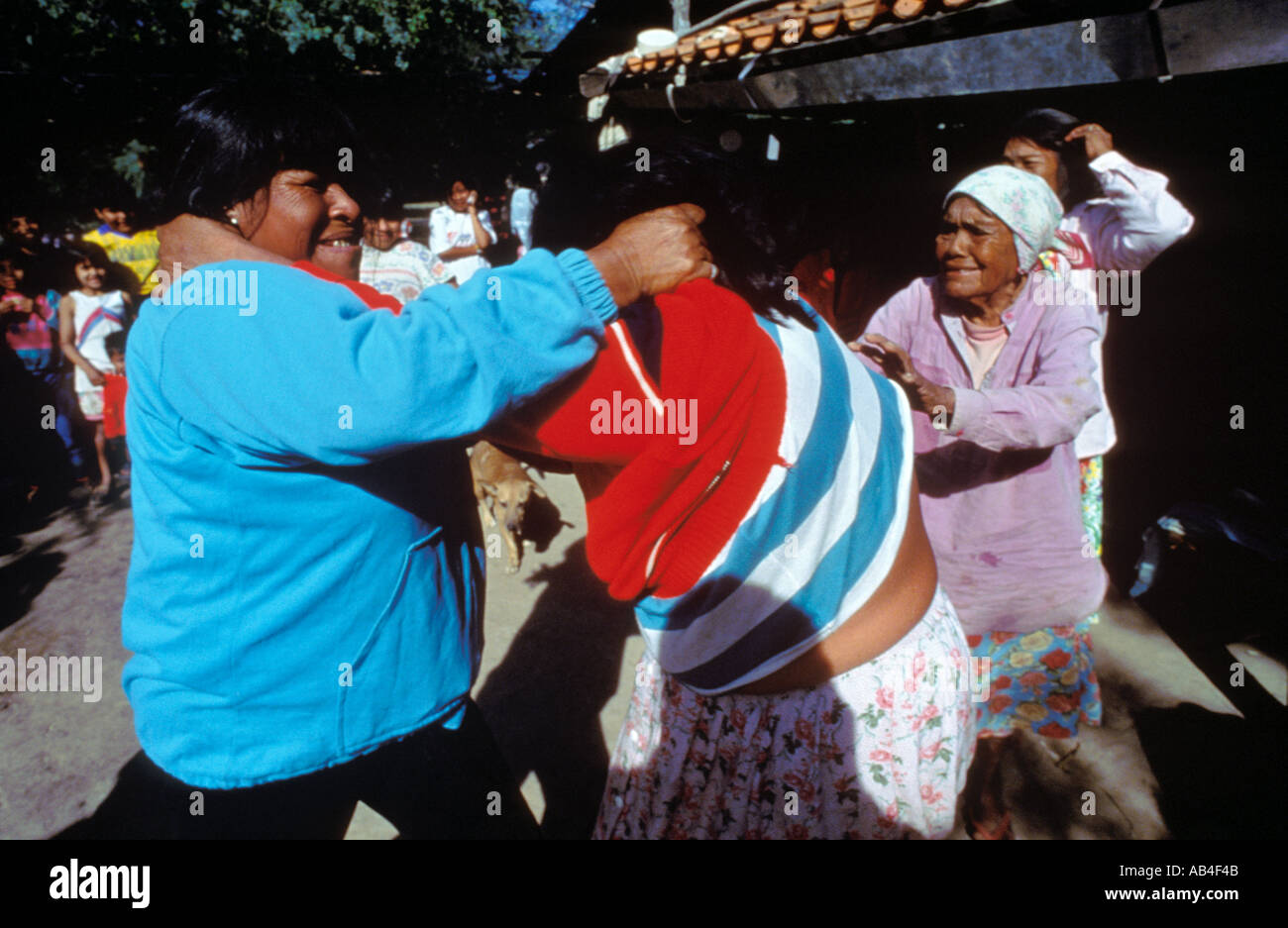 Female members of the Nivacle Indian tribe re enact a ritual fight used to settle an amourous dispute in Filadelfia Paraguay  Stock Photo