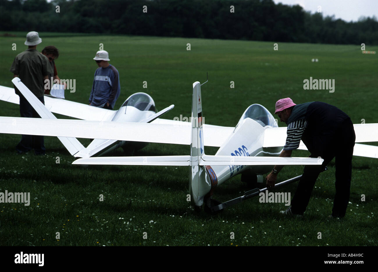 Pilots prepare their gliders before take off from Langenfeld airfield, Germany. Stock Photo