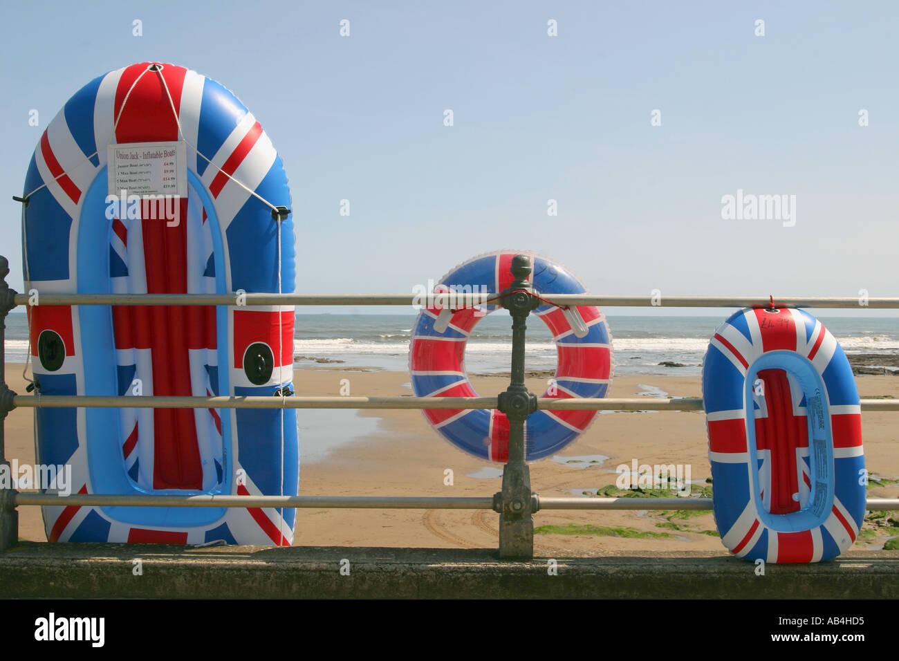 Inflatable dinghies and swimming-ring for sale on the seafront in Scarborough, Yorkshire, UK. Stock Photo