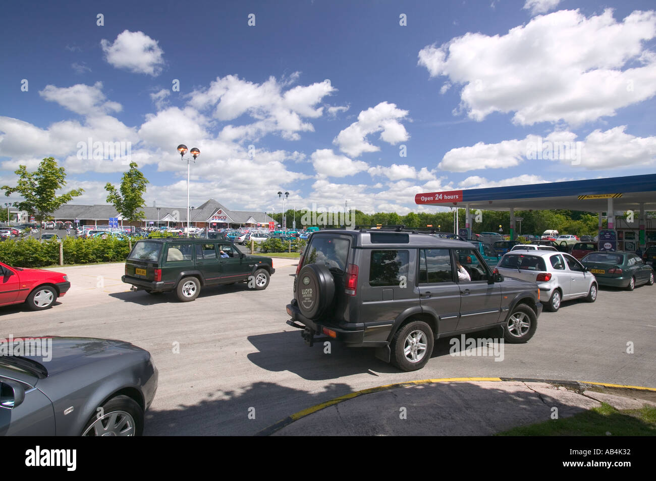 Queueing for petrol at a tesco supermarket petrol station Carlisle
