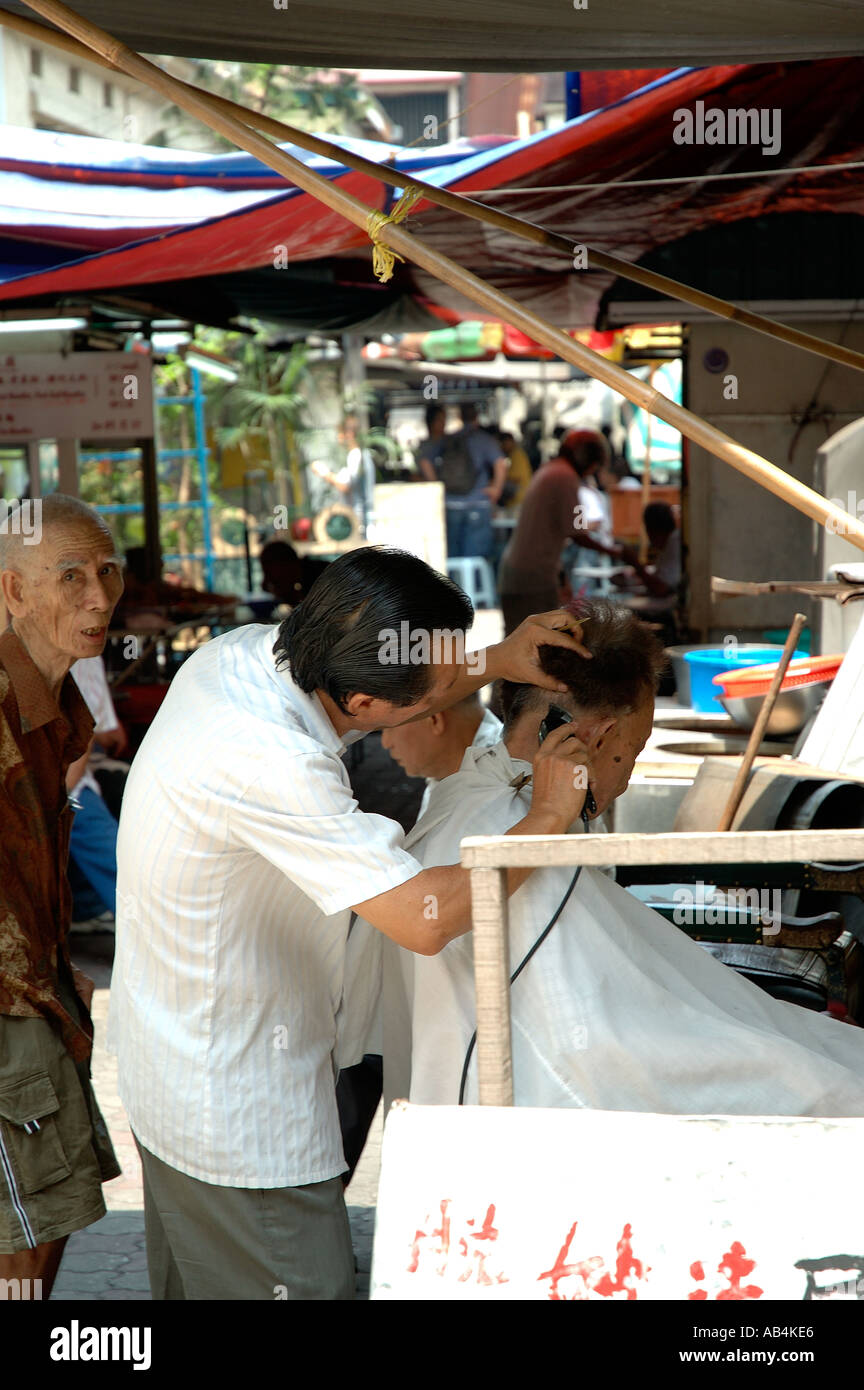 Open air barber shop in Petaling Street Malaysia Stock Photo Alamy