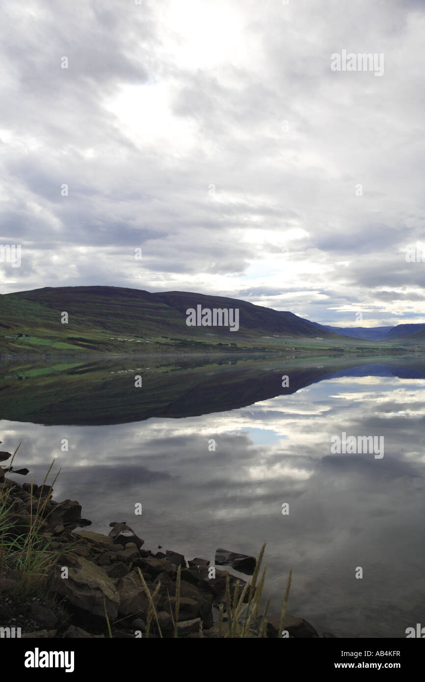 Stunning tranquil lake reflection and sky Iceland Stock Photo - Alamy