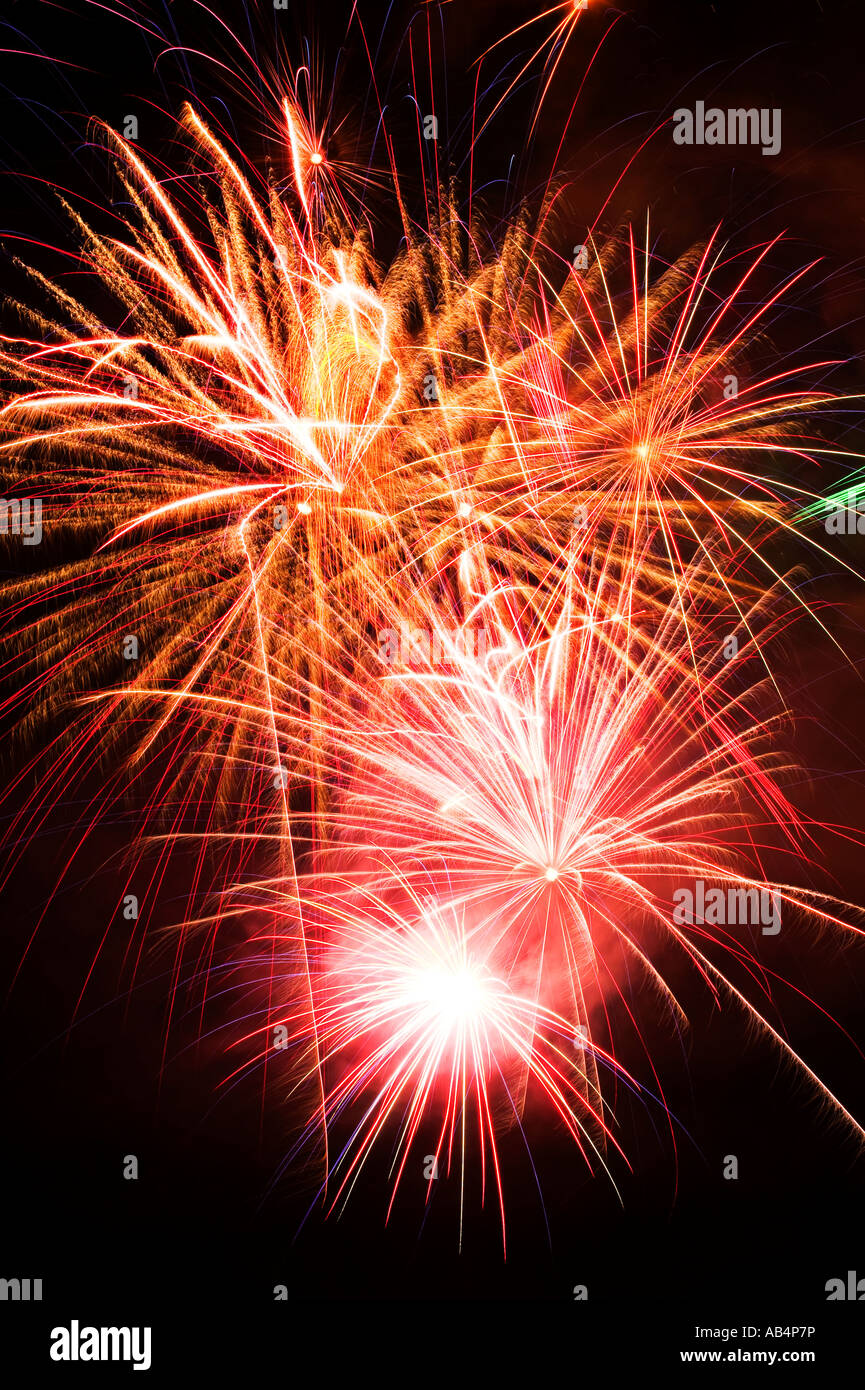 Fireworks exploding in night sky Stock Photo Alamy