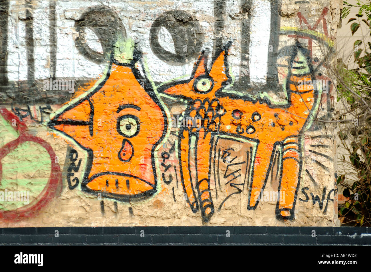 Graffiti on a brick wall, Barcelona, Spain Stock Photo