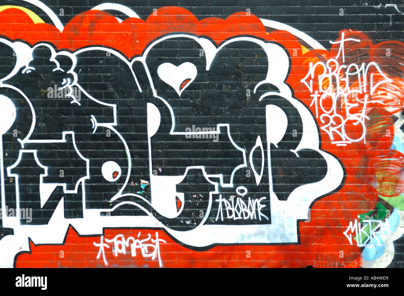 Graffiti on a brick wall, Barcelona, Spain Stock Photo