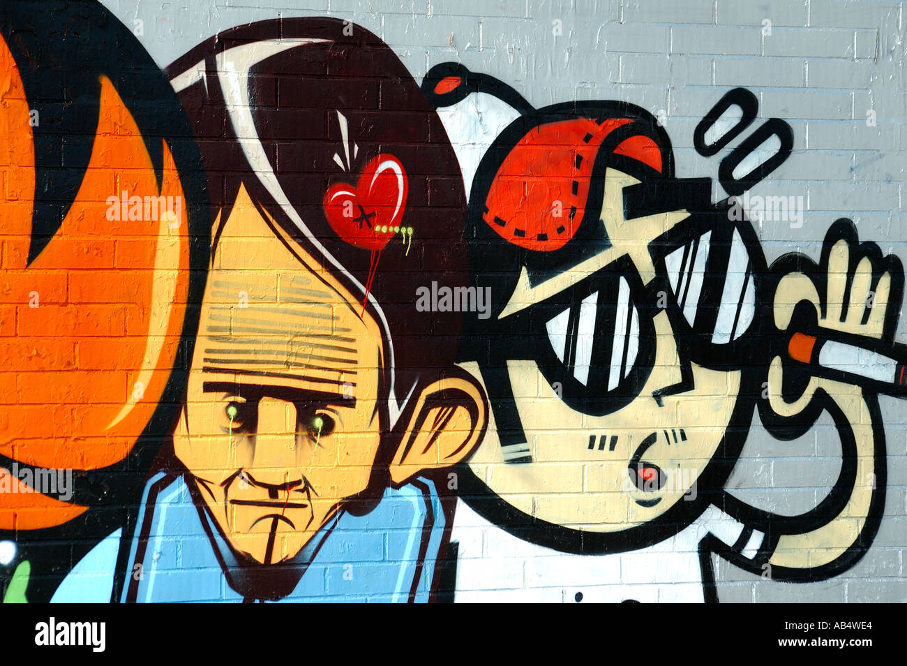 Graffiti on a brick wall, Barcelona, Spain Stock Photo