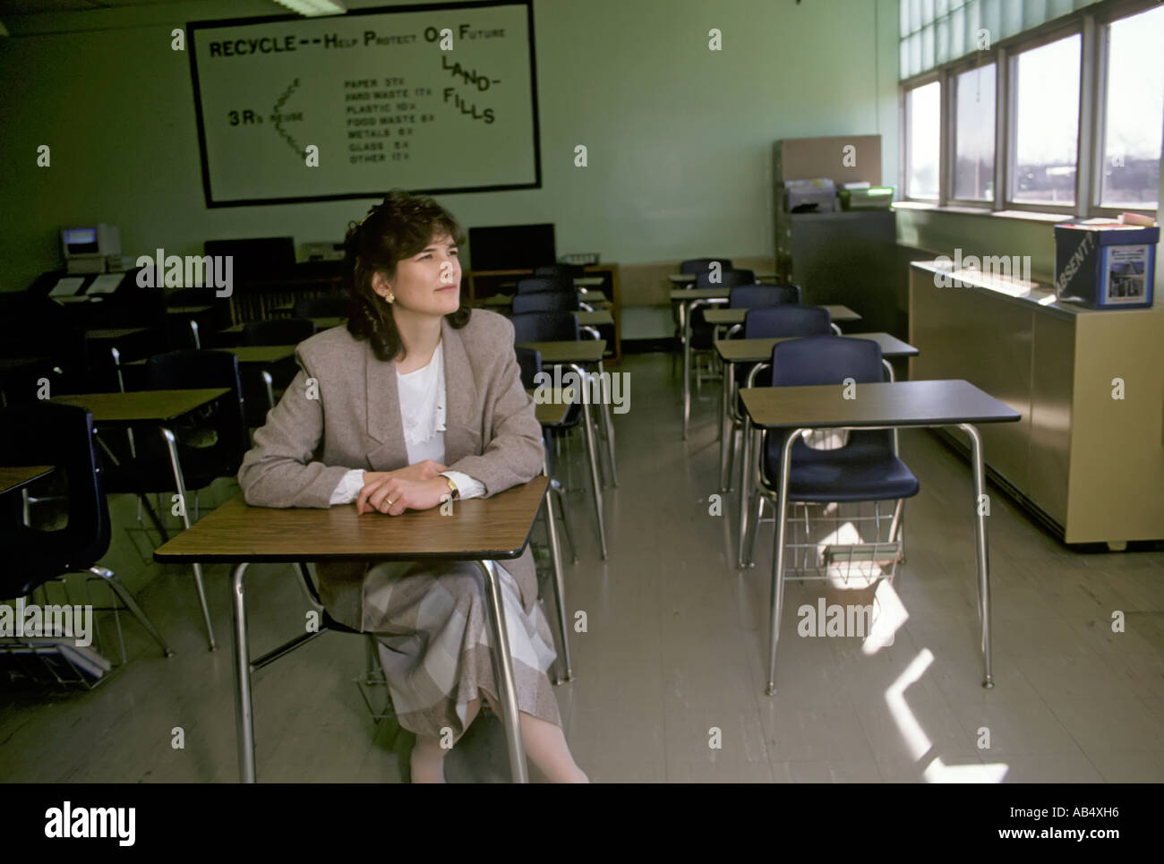 Female teacher alone in empty hires stock photography and images Alamy
