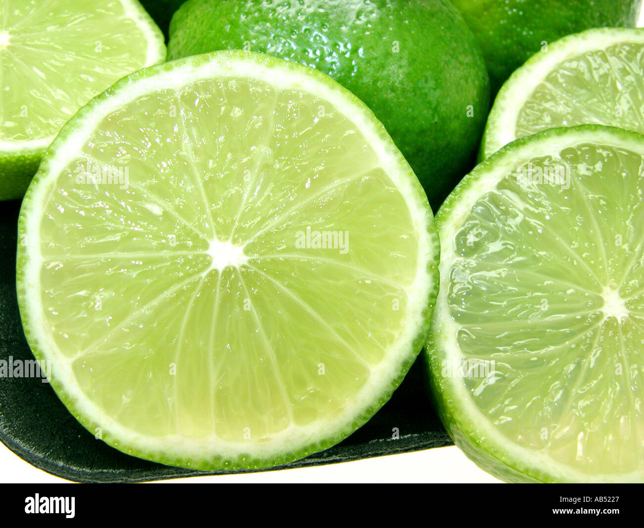green limes lemon cut out cutout lime slice Stock Photo Alamy