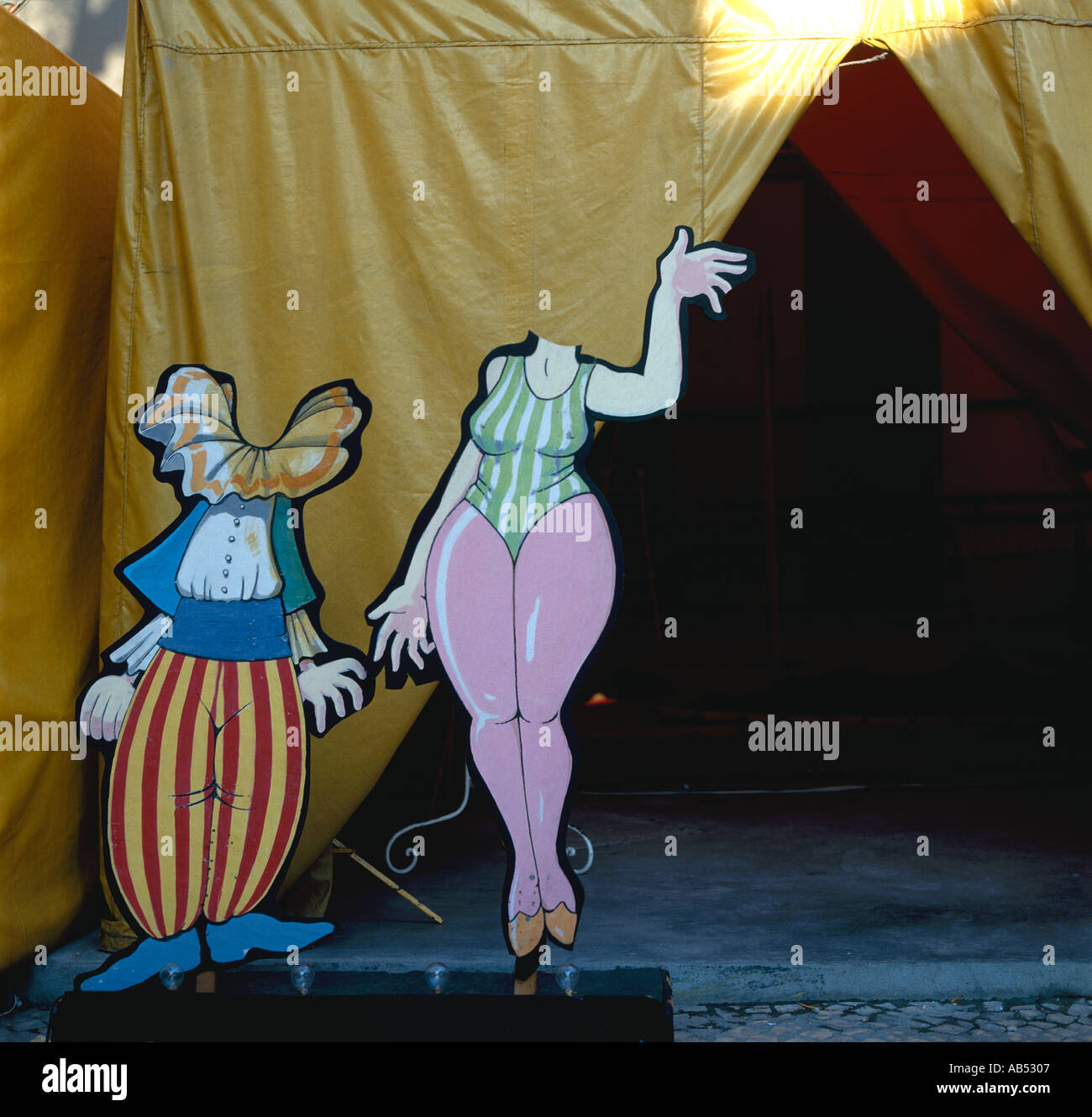 Funny cardboard cutout figures used as props for pictures at side entry