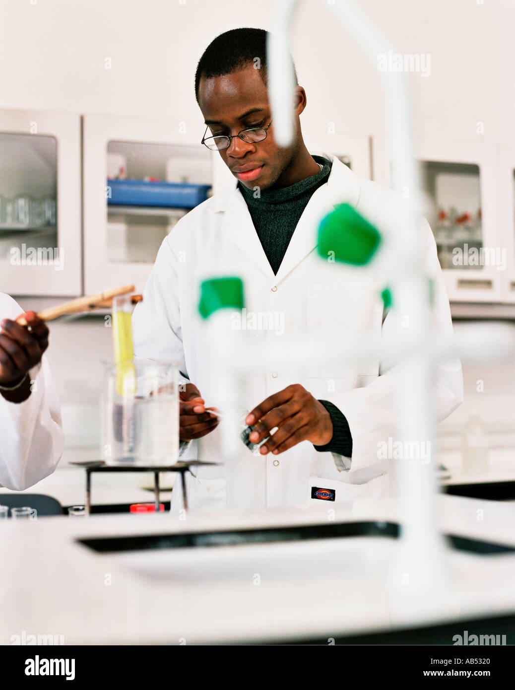 Black chemist in laboratory Stock Photo Alamy Black chemist in laboratory Stock Photo Alamy