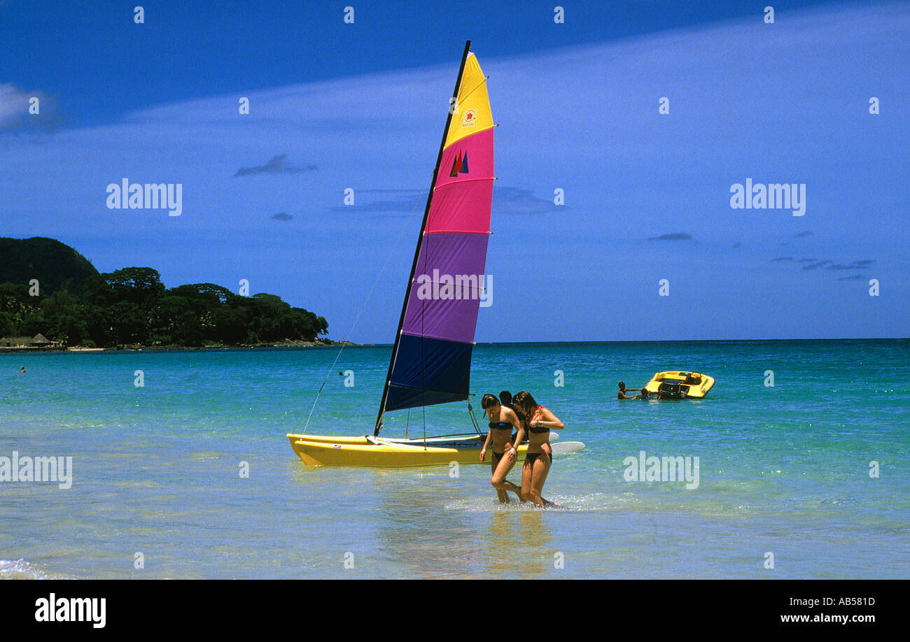 windurf catamaran at beach island of mahe seychelles Stock Photo